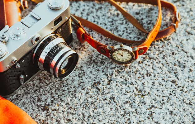 Photo of vintage camera at sunset in park