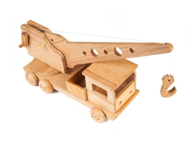 Photo of a wooden crane truck made of beech on a white isolated background