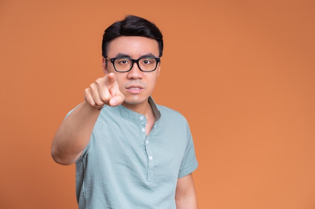 Photo of young Asian man on background