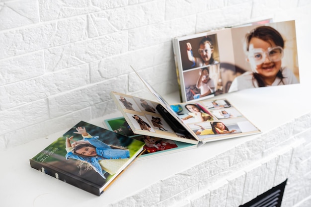 photobook of a little girl. Family, childhood and leisure concept.