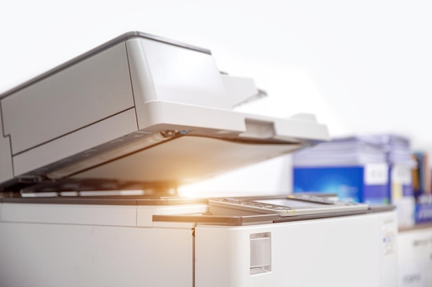 Photocopier printer Close up the copier or photocopy machine office equipment workplace for scanner or scanning document and printing or copy paper duplicate and Xerox