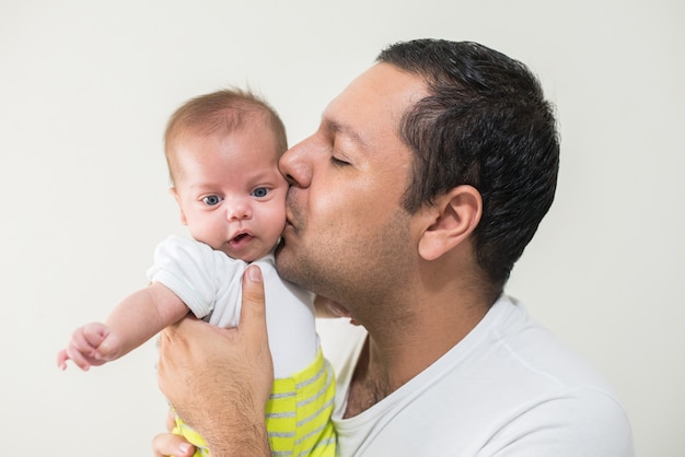 Photograph of father and his baby