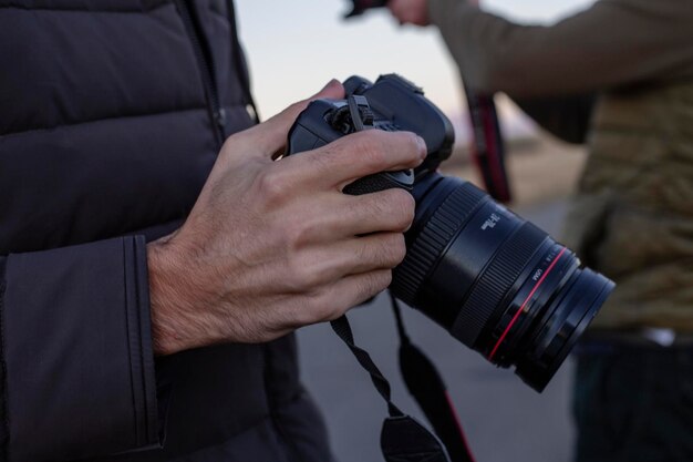 Photographer holding a camera