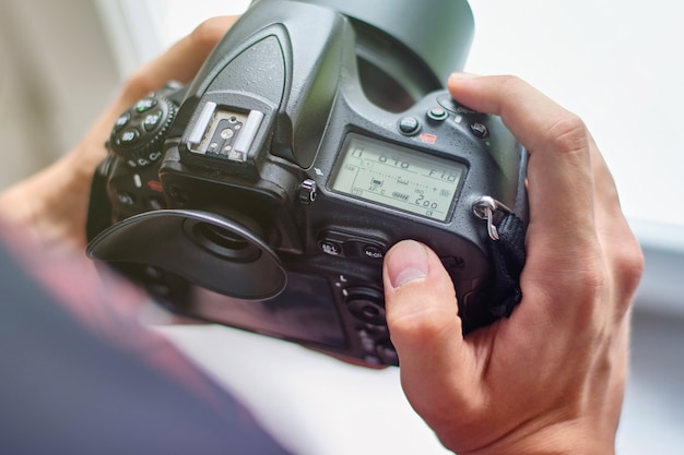 Photographer setting up camera for a shooting