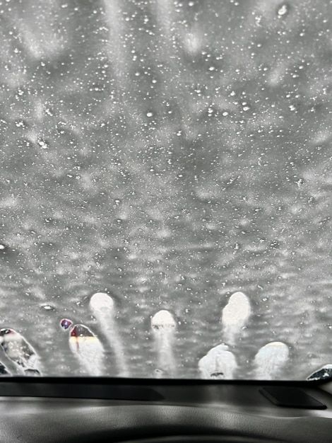 A photography of a car dashboard with a bunch of birds on it