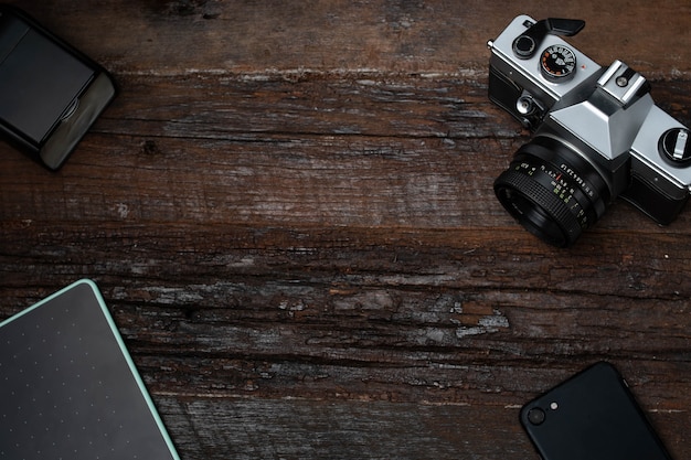 Photography equipment on a wooden table