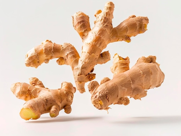 photography of GINGER falling from the sky hyperpop colour scheme glossy white background Flying ginger root with slices collection isolated on white background