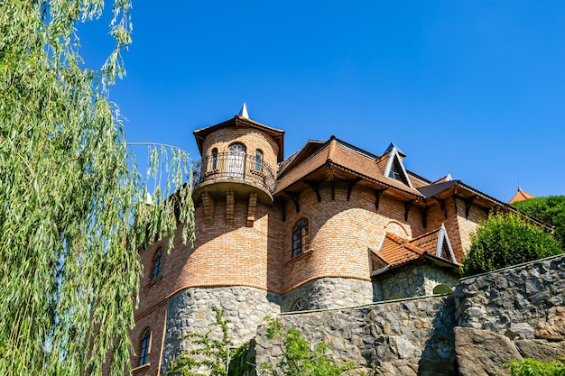 Photography on theme ancient brick castle with large tower