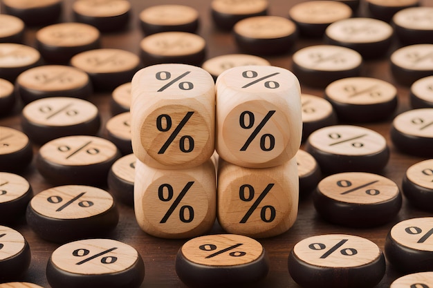 PhotoStock Wooden cubes with percentage symbol and arrows financial growth concept