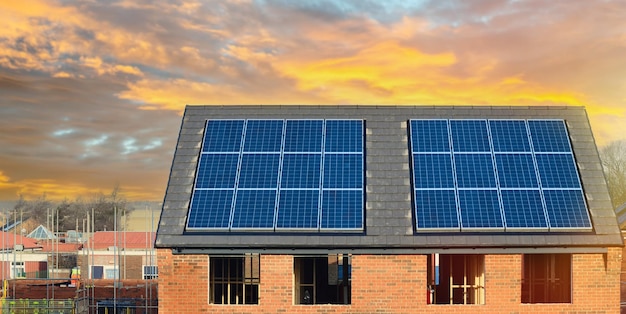 Photovoltaic solar panels on the roof of new house Roof with solar panels