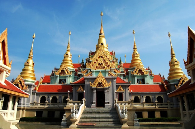 Phra Mahathat Chedi Phakdee Prakat Buddhist temple on top of hill for thai people and foreign travelers travel visit and respect praying buddha at Bang Saphan city in Prachuap Khiri Khan Thailand