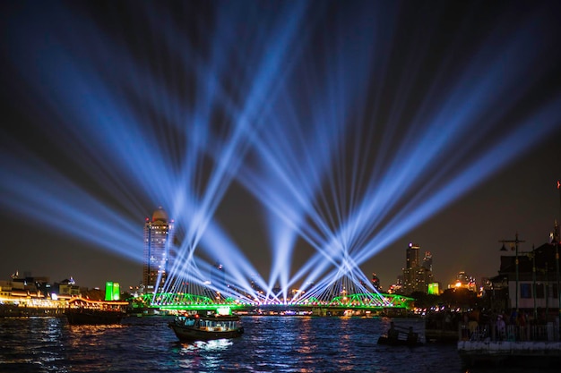 Phra Phuttha Yodfa Bridge or Memorial Bridge light up with fireworks event show 'Vijit Chao Phraya' lighting extravaganza with firework at Memorial Bridge