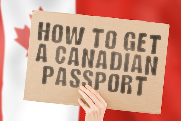 The phrase  How to get a Canadian passport  on a banner in mens hand Recognition Personality