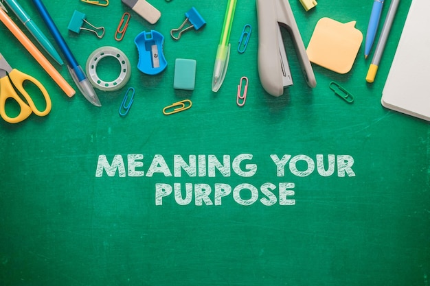 Phrase meaning your purpose and school supplies on green