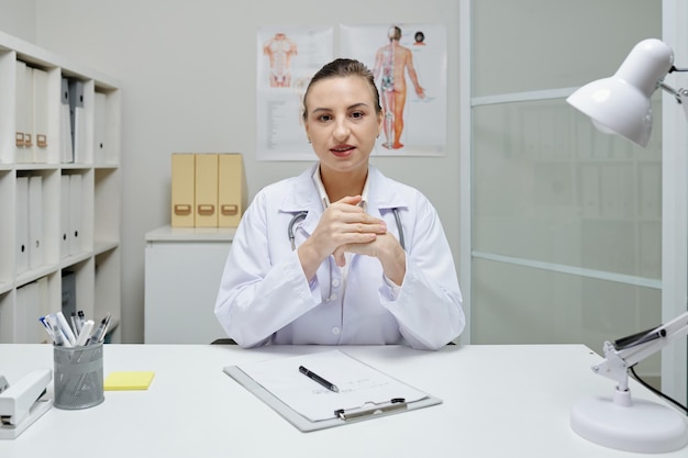 Physician Working at Table