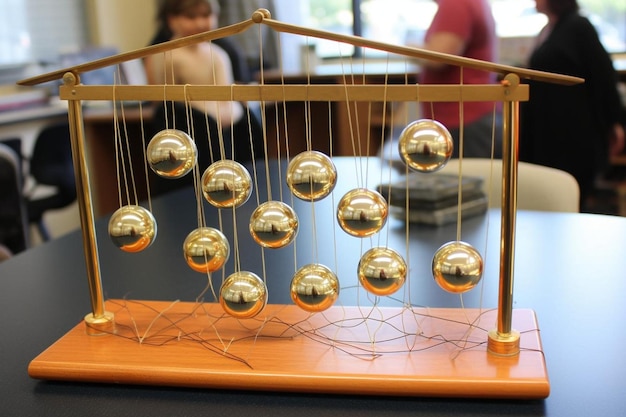 Photo physics classroom with a newtons cradle