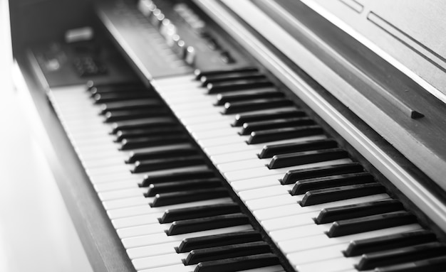 Piano keyboard background with selective focus.