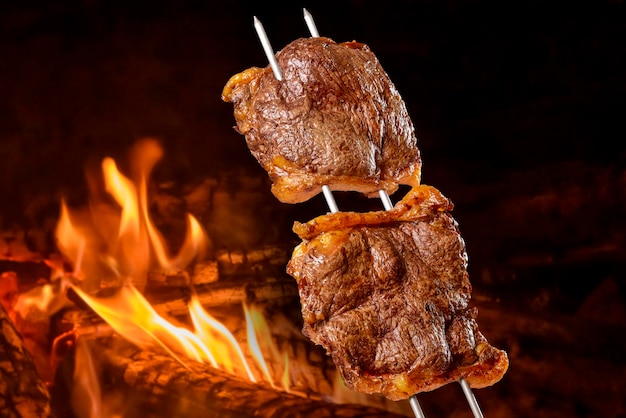 Picanha barbecue roasted on the spit on the coals It is widely consumed throughout Brazil