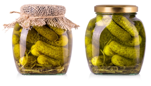 Pickled cucumbers in glass jar on a white background with clipping path