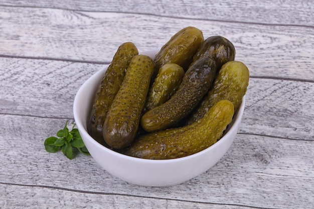 Pickled cucumbers heap in the bowl