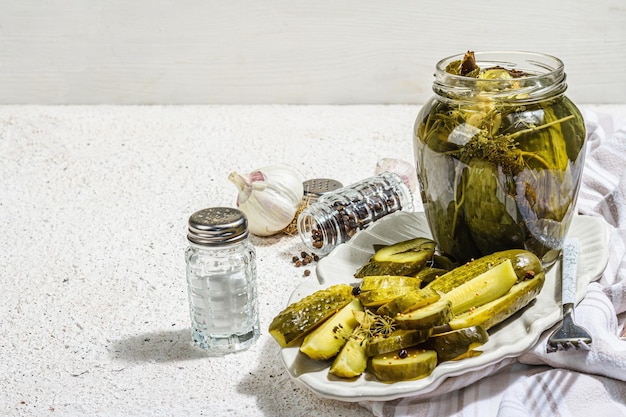 Pickled cucumbers for winter organic food Jar of homemade gherkins clean eating vegan concept