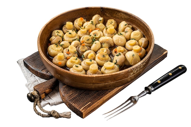 Pickled Marinated mushrooms champignons in a wooden plate Isolated on white background top view