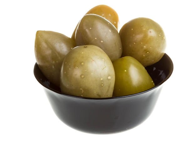 Pickled tomatoes isolated on the white background