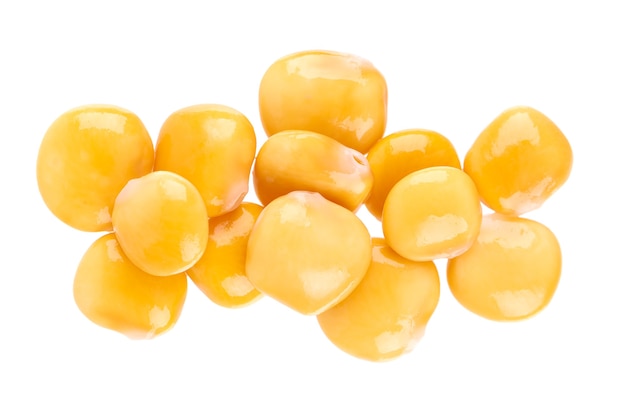 Pickled yellow lupine beans isolated on white background tournus preserved lupinus top view