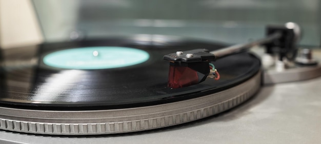 The pickup head of the vinyl disc player shallow depth of field