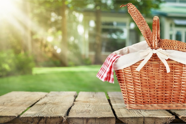 Picnic Basket with napkin on nature background