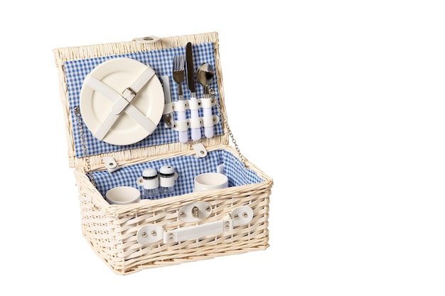 picnic box wicker white with utensils, plates, forks, knives, cups, isolated on white