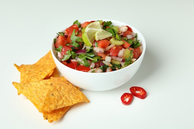 Pico de Gallo and chips on white background