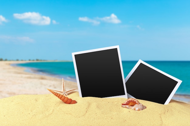 Pictue frame on shells and sand background