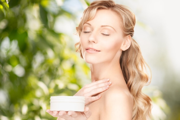 picture of beautiful woman with moisturizing creme