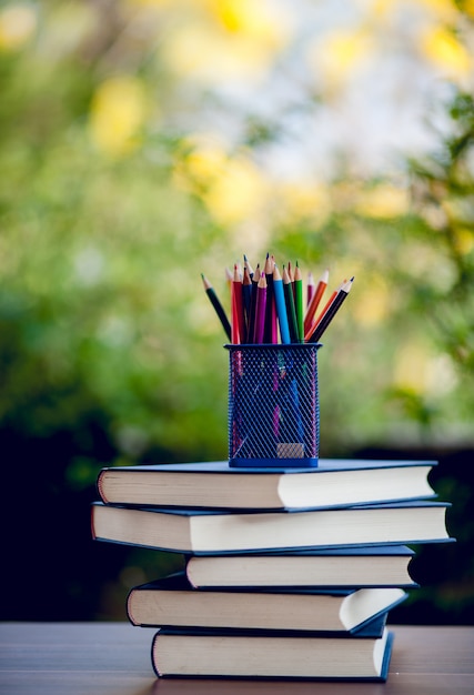 Picture of books and educational equipment placed on the table Educational concept with copy space