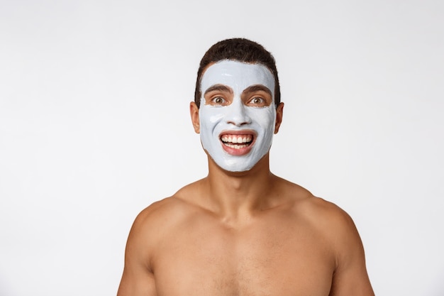 Picture of cheerful nice young guy smiling on camera.