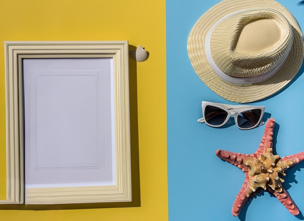 A picture frame, sunglasses, and a starfish are on a blue and yellow background.