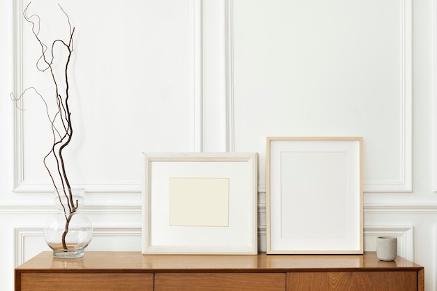 Picture frames on a wooden cabinet