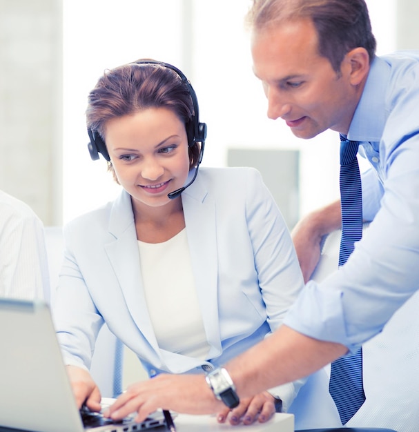 Photo picture of group of people working in call center or office