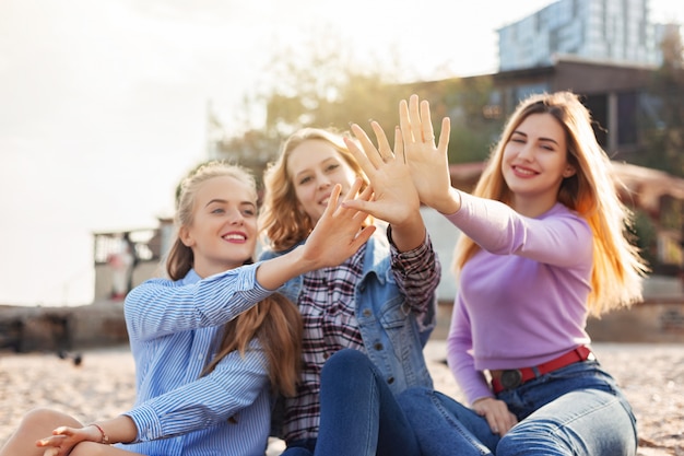 A picture of a group of women having fun on the beach