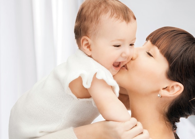 picture of happy mother with adorable baby (focus on woman)