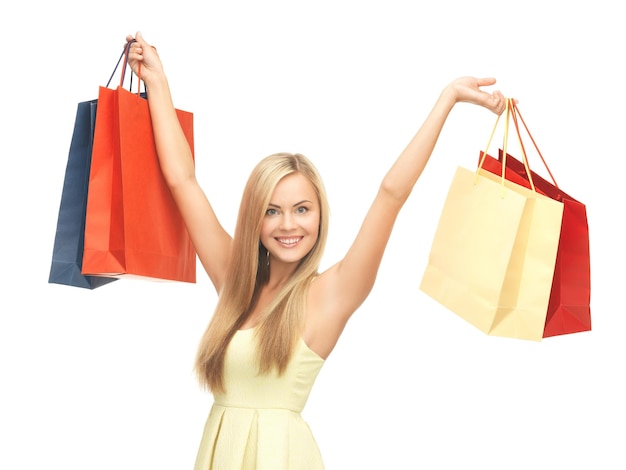 picture of happy woman with shopping bags .