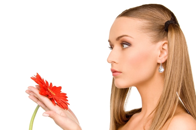 picture of lovely woman in towel with red flower