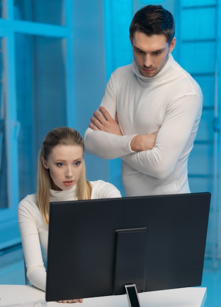 picture of man and woman in space laboratory