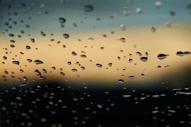 A picture of rain drops on a window.