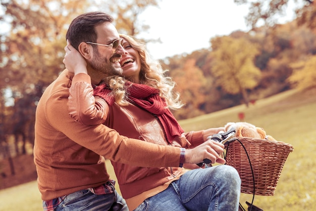 Picture of romantic couple riding bikes