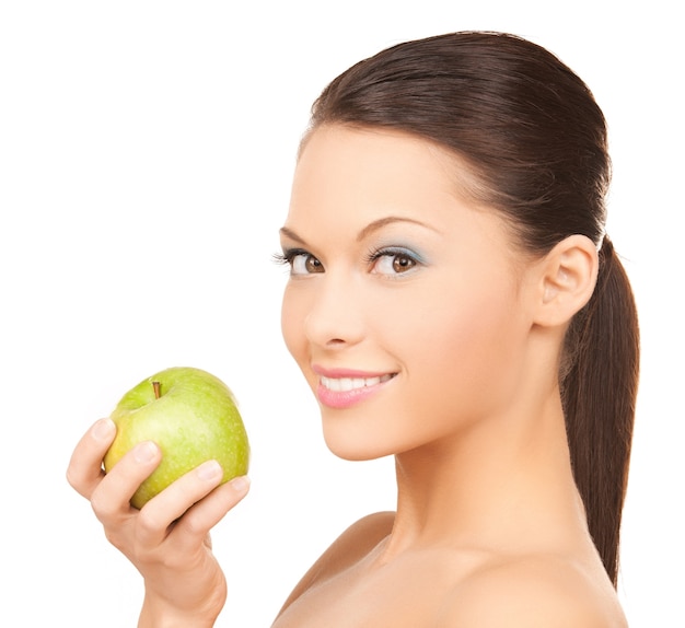 picture of smiling woman in with an apple