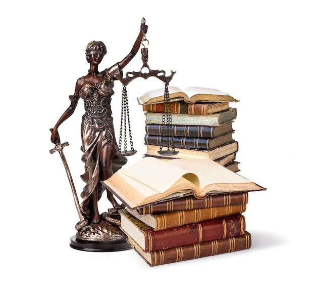 A picture of a Themis statue standing at books  on white background