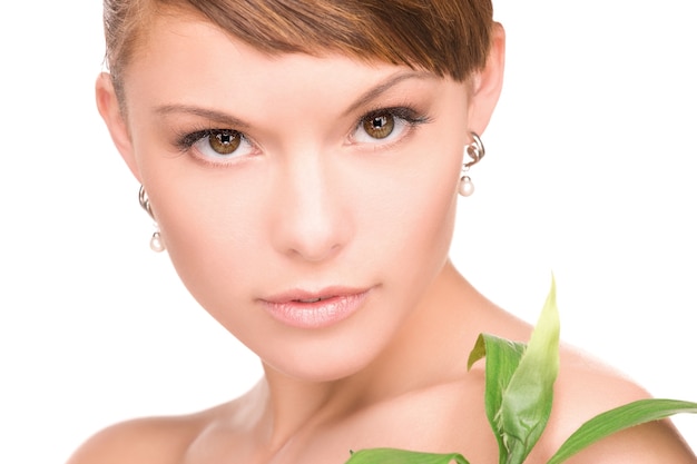 picture of woman with sprout over white