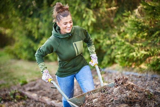 Picture of woman working with tools in the garden